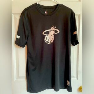 Miami Heat black medium shirt with reflective logo and sleeves. Never been worn!